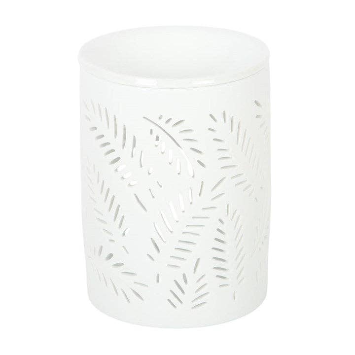 Quemador de cera blanco, con diseño recortado de helecho frondoso